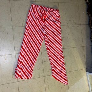 I’m selling candy cane fuzzy sweat pants.
